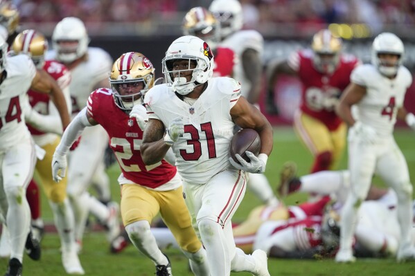 McCaffrey scores 3 TDs and 49ers clinch NFC West with 45 29 rout